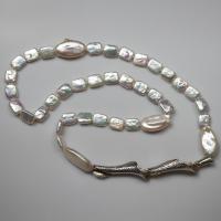 Pearl Necklace with Conch Shell Clasp